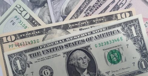 scattered US dollar banknotes in $1, $10, $20, $50 and $100 denominations. scattered US dollar banknotes in $1, $10, $20, $50 and $100 denominations.