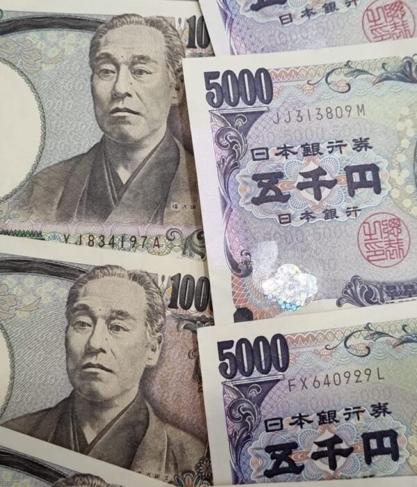 Japanese yen banknotes in 1,000 and 5,000‑yen denominations arranged together. Japanese yen banknotes in 1,000 and 5,000‑yen denominations arranged together.