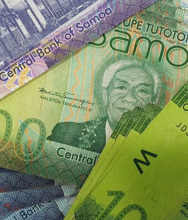 Samoan banknotes in 50 and 100 tala denominations arranged together, featuring colourful portraits and traditional cultural designs. Samoan banknotes in 50 and 100 tala denominations arranged together, featuring colourful portraits and traditional cultural designs.