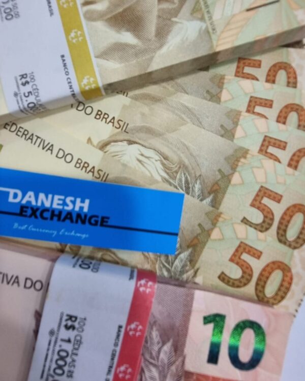 Brazilian real currency notes featuring 50 and 10 BRL designs alongside Danesh exchange branding.