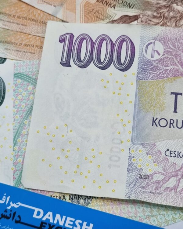 Czech koruna banknotes in 200 and 1,000‑koruna denominations arranged together. Czech koruna banknotes in 200 and 1,000‑koruna denominations arranged together.