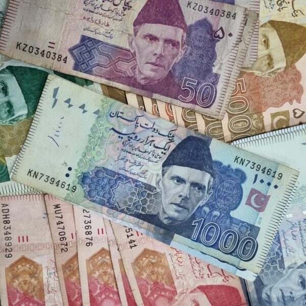 Pakistani rupee banknotes in multiple denominations arranged together. Pakistani rupee banknotes in multiple denominations arranged together.