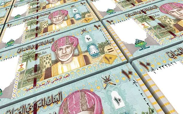 omani-rials-bills-stacked-backgr